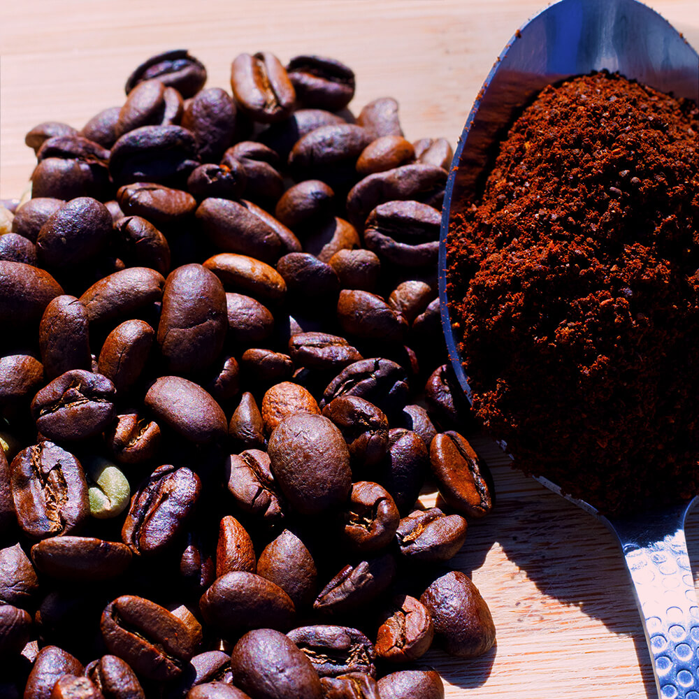 Bullocks Beans and spoon of ground coffee